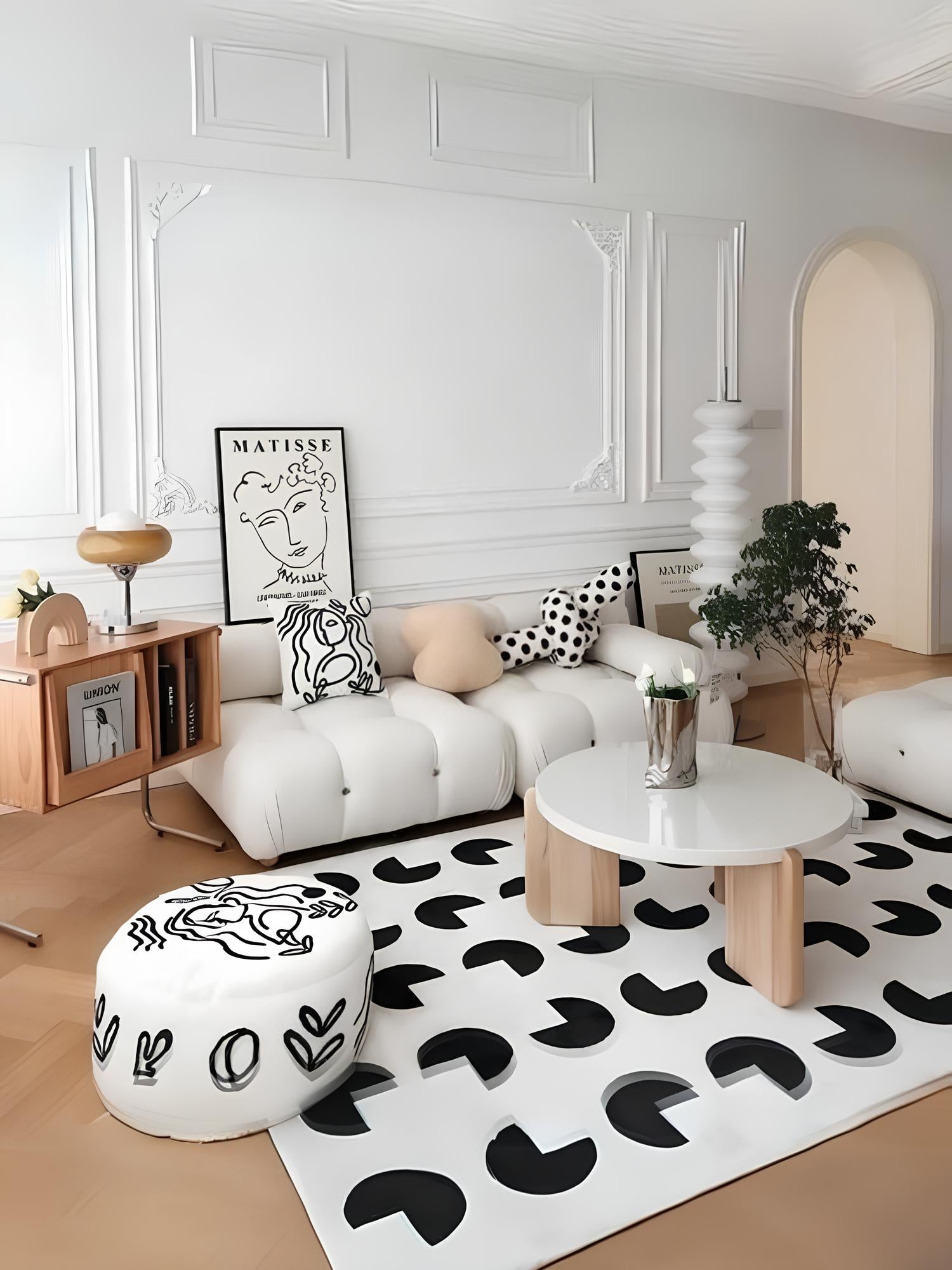 Tapis blanc avec motifs noirs